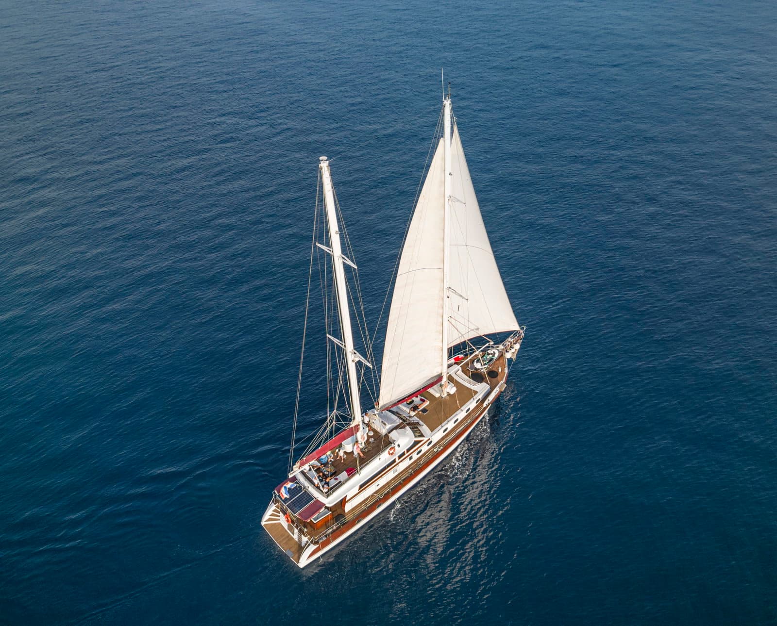 Gulet under sail in warm May weather
