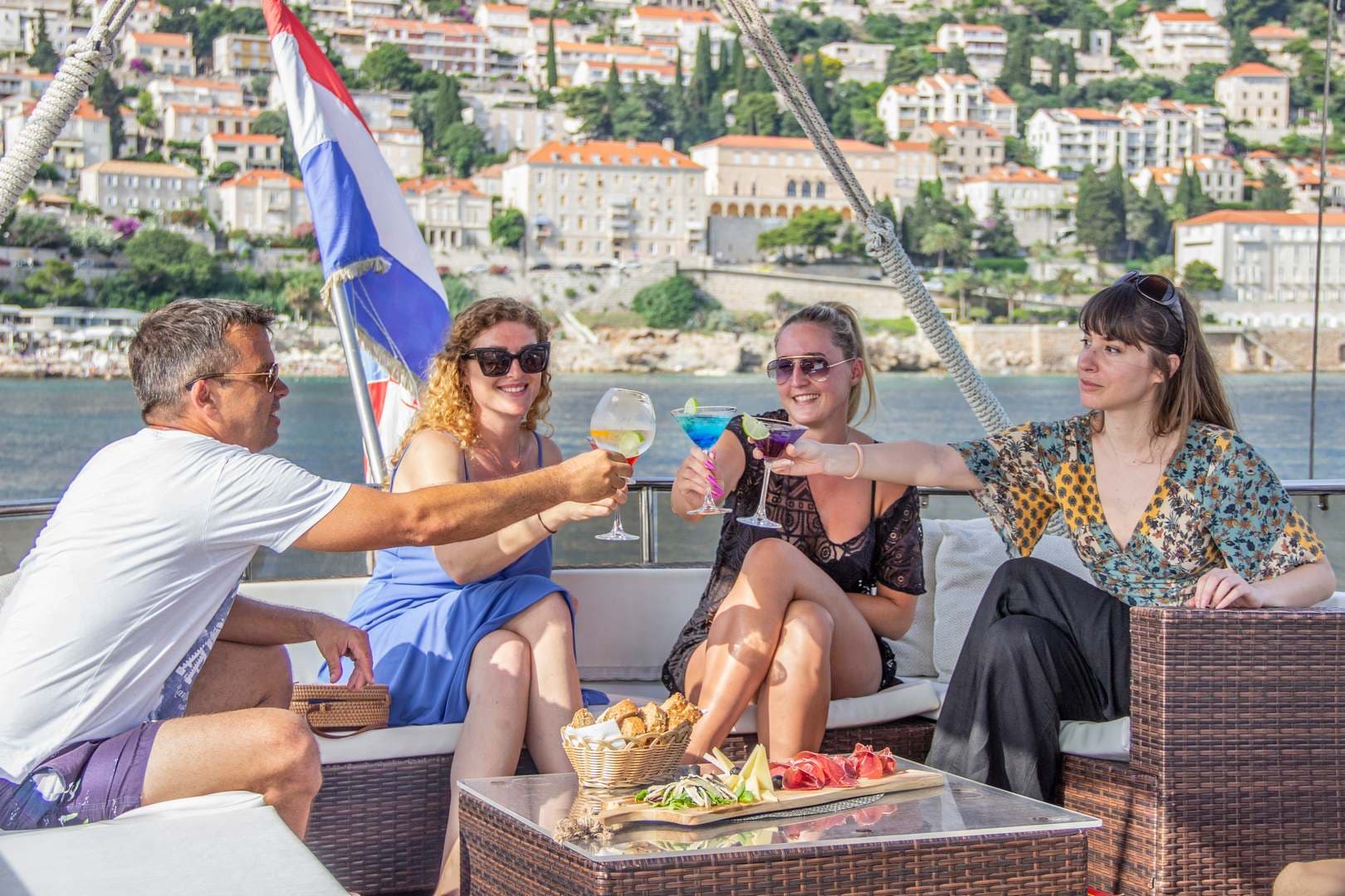 Guests enjoying wine on deck