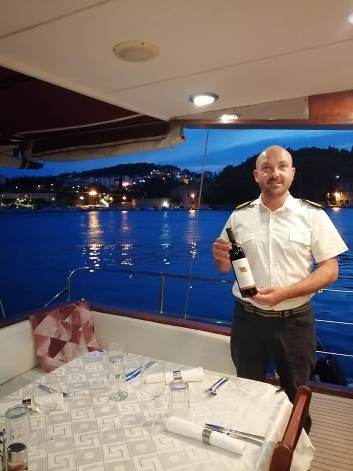 Captain Ante at the helm of the gulet
